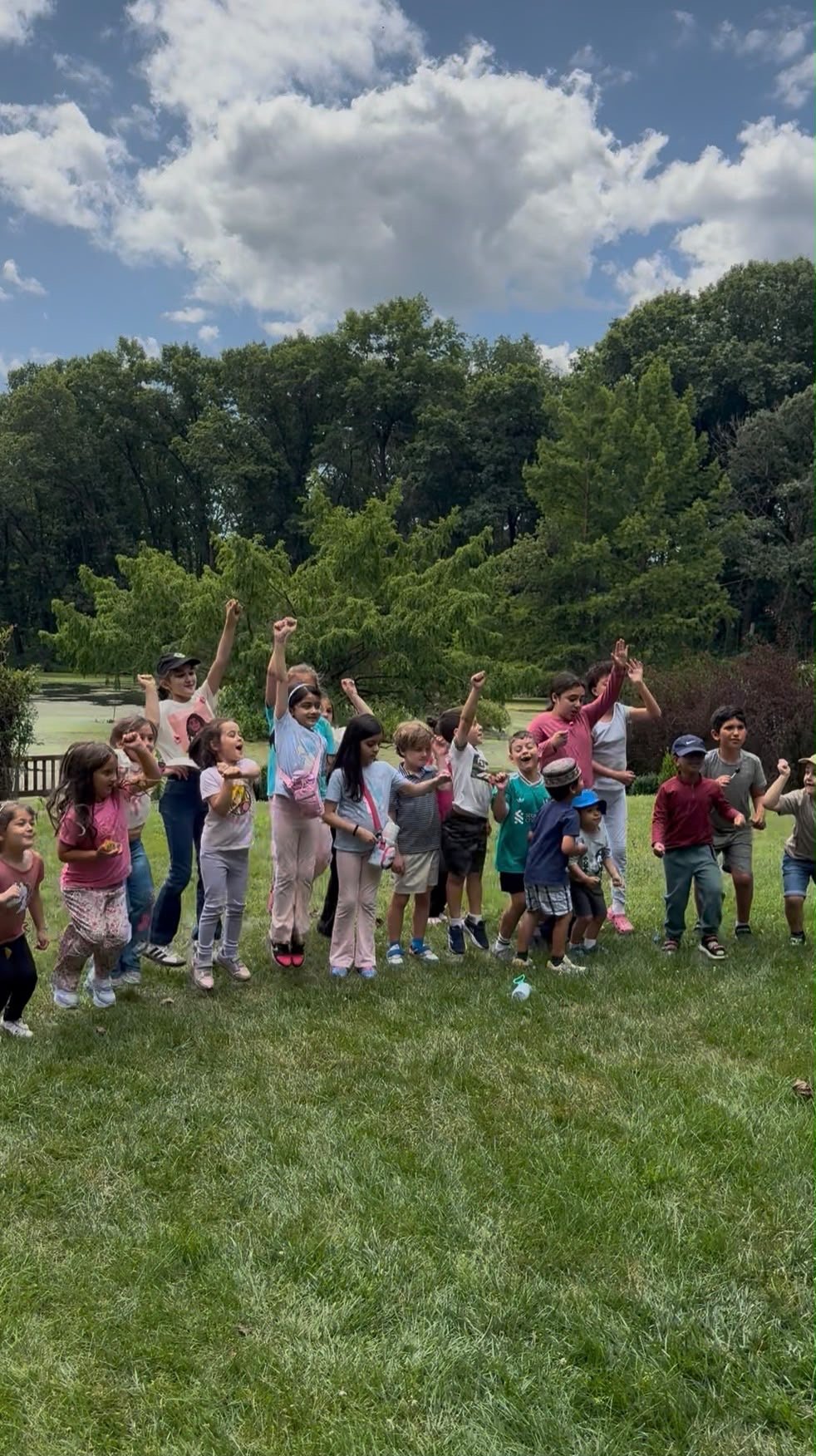 Cubs kids jumping with excitement